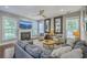 Inviting living room featuring a fireplace, ceiling fan and comfortable seating for entertaining guests at 219 Silverwood Ln, Summerville, SC 29485