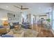 Open concept living room flows seamlessly into a modern kitchen, great for entertaining guests at 219 Silverwood Ln, Summerville, SC 29485