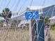Sign marks beach access path amid dunes, suggesting nearby beachfront property at 2501 Myrtle St, Edisto Beach, SC 29438