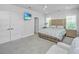 Stylish bedroom featuring a unique headboard, modern decor, and ample natural light at 2501 Myrtle St, Edisto Beach, SC 29438