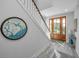 Foyer with stairs and a decorative map hanging on the wall at 2501 Myrtle St, Edisto Beach, SC 29438