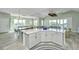 Bright open-concept living area with an open kitchen and dining area at 2501 Myrtle St, Edisto Beach, SC 29438