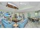 Cozy living space featuring kitchen, dining, and living area with nautical-themed decor at 2501 Myrtle St, Edisto Beach, SC 29438