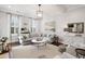 Inviting living room with natural light, plush seating, and stylish decor creates a comfortable and sophisticated ambiance at 2522 Daniel Island Dr, Daniel Island, SC 29492
