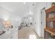 Spacious living room featuring plush carpeting, bright lighting, and neutral decor at 2522 Daniel Island Dr, Daniel Island, SC 29492