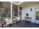 Relaxing screened-in porch with comfortable seating, perfect for enjoying the outdoors while protected from insects at 2522 Daniel Island Dr, Daniel Island, SC 29492