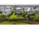 Aerial view of a pristine house set amid lush greenery, offering a sense of privacy and tranquility at 2522 Waverly St, Charleston, SC 29492