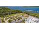 Aerial view of community park with playground, grassy area, and covered seating near the water and docks at 2522 Waverly St, Charleston, SC 29492