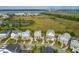 Panoramic aerial view of community nestled by the water, highlighting picturesque homes and serene landscapes at 2522 Waverly St, Charleston, SC 29492