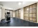 Finished basement with exercise equipment, rubber floor and window egress at 2522 Waverly St, Charleston, SC 29492