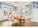 Elegant dining room with unique wallpaper, chandelier lighting, and hardwood floors at 2522 Waverly St, Charleston, SC 29492