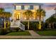 Charming two-story home features inviting front porch, manicured landscaping, and classic architectural style at 2522 Waverly St, Charleston, SC 29492