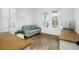 Bright office space featuring a sofa, desk, and doors to the outside at 2522 Waverly St, Charleston, SC 29492