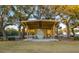 Beautiful park pavilion surrounded by lush trees, offering shade and seating at 2522 Waverly St, Charleston, SC 29492
