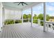 Back porch overlooking trees on a beautiful day at 2522 Waverly St, Charleston, SC 29492