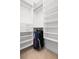 Walk-in closet with built-in shelving and hanging rods for ample storage at 2522 Waverly St, Charleston, SC 29492