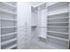 Walk-in closet with multiple tiers of shelving and drawer space at 2522 Waverly St, Charleston, SC 29492