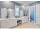 Spacious bathroom with dual vanities, a walk-in shower, and modern fixtures at 2557 Hatch Dr, Johns Island, SC 29455