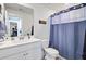 Clean bathroom featuring a single vanity, tiled floors, and a shower-tub combo at 2557 Hatch Dr, Johns Island, SC 29455