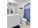 Clean bathroom featuring a single vanity, tiled floors, and a shower-tub combo at 2557 Hatch Dr, Johns Island, SC 29455