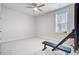 Bedroom with a weight bench and large window for lots of natural light at 2557 Hatch Dr, Johns Island, SC 29455