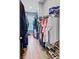 Walk-in closet with hanging racks and shelving for plenty of storage and organization at 2557 Hatch Dr, Johns Island, SC 29455