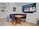 Corner nook featuring booth seating, a mounted TV, and hardwood floors at 2557 Hatch Dr, Johns Island, SC 29455