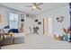 Cozy living room features a lounger, a decorative basket, and lots of wall art at 2557 Hatch Dr, Johns Island, SC 29455