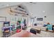 Spacious living room with arcade games, a seating area, and plenty of natural light at 2557 Hatch Dr, Johns Island, SC 29455