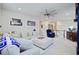 Spacious living room with comfortable seating arrangement, featuring a large ottoman at 2557 Hatch Dr, Johns Island, SC 29455