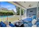 Outdoor patio featuring comfortable seating, a BBQ grill and a view of the pool at 2557 Hatch Dr, Johns Island, SC 29455