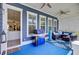 Cozy patio featuring blue floors, blue furniture, a BBQ grill, and a ceiling fan at 2557 Hatch Dr, Johns Island, SC 29455