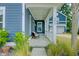 Cozy porch with rocking chairs, offering a charming outdoor space and relaxing ambiance at 2557 Hatch Dr, Johns Island, SC 29455