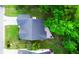 Aerial view of a home displaying the roof, deck, and surrounding lush greenery and neighboring residences at 2560 Palmetto Hall Blvd, Mount Pleasant, SC 29466