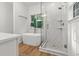 Luxury bathroom with a standalone tub, glass shower, and natural light at 2560 Palmetto Hall Blvd, Mount Pleasant, SC 29466