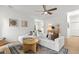 Bright living room featuring a comfortable sectional sofa, wood floors, and stylish decor at 2560 Palmetto Hall Blvd, Mount Pleasant, SC 29466