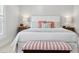 Bedroom featuring a comfortable bed with accent pillows, and a dark wood storage chest at the foot at 2578 Helmsman Rd, Johns Island, SC 29455