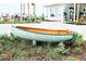 Charming boat-themed decor adds nautical flair to the property's exterior and curb appeal at 2578 Helmsman Rd, Johns Island, SC 29455