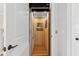 Residential elevator featuring wood paneling, lighting, and wall decor inside the elevator car at 2578 Helmsman Rd, Johns Island, SC 29455