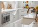 Bright kitchen with stainless steel oven, white cabinets, quartz countertops, and natural light at 2578 Helmsman Rd, Johns Island, SC 29455