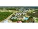 Aerial view of community amenities including a pool, tennis court, and golf course at 2645 Crooked Stick Ln, Mount Pleasant, SC 29466