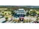 Aerial view showcasing the clubhouse with its beautiful grounds and parking at 2645 Crooked Stick Ln, Mount Pleasant, SC 29466