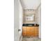 Bathroom boasting granite vanity with black countertop and wooden drawers at 2645 Crooked Stick Ln, Mount Pleasant, SC 29466