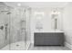 Modern bathroom features a glass-enclosed shower, dual vanity with granite countertops, and patterned tile floors at 2645 Crooked Stick Ln, Mount Pleasant, SC 29466