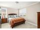 Bedroom featuring neutral carpet, natural light, and a wood bed set at 2645 Crooked Stick Ln, Mount Pleasant, SC 29466