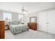 Bedroom boasting natural light with ceiling fan and double door closet at 2645 Crooked Stick Ln, Mount Pleasant, SC 29466