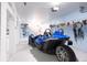 Clean, well-organized garage space with epoxy floor and storage at 2645 Crooked Stick Ln, Mount Pleasant, SC 29466
