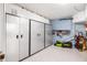 Garage with storage cabinets and epoxy floor at 2645 Crooked Stick Ln, Mount Pleasant, SC 29466