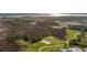 Scenic golf course view with lush green fairways, sand traps, and picturesque marshland in the distance at 2645 Crooked Stick Ln, Mount Pleasant, SC 29466