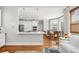 Open kitchen with a view to the adjacent dining area, light hardwood floors, and recessed lighting at 2645 Crooked Stick Ln, Mount Pleasant, SC 29466